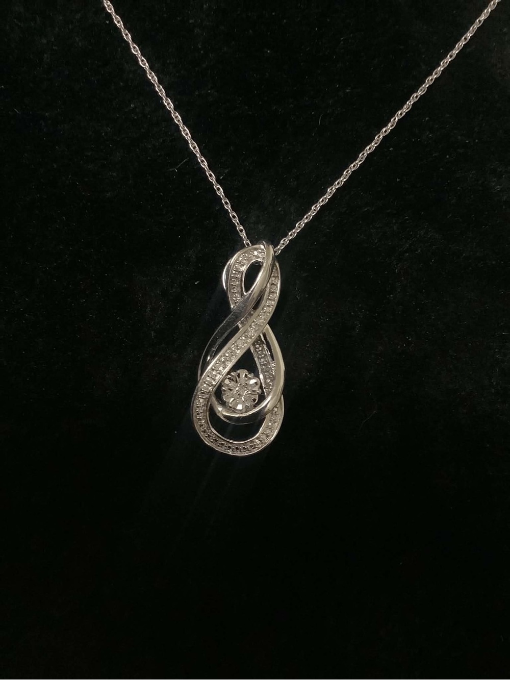 Silver Infinity Twist Pendant Necklace with Center Stone